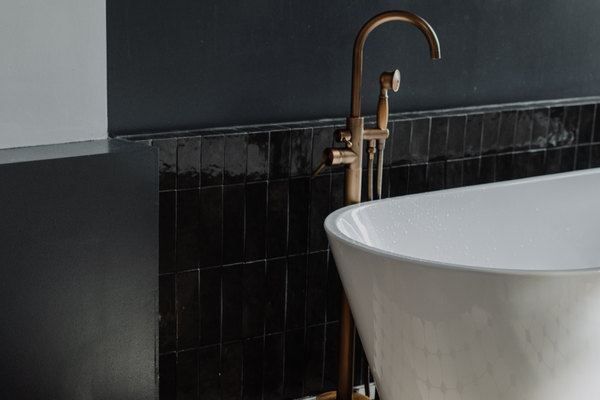 16 Beautiful Black Bathrooms That Are Both Moody and Chic