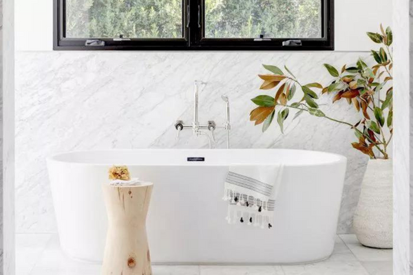 20 Stylish Marble Bathrooms, From Small Spaces to All-White Ones